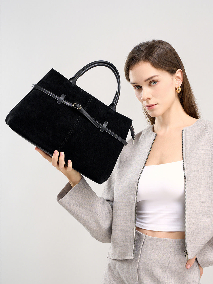 The Arden Leather Carryall in Black — styled view