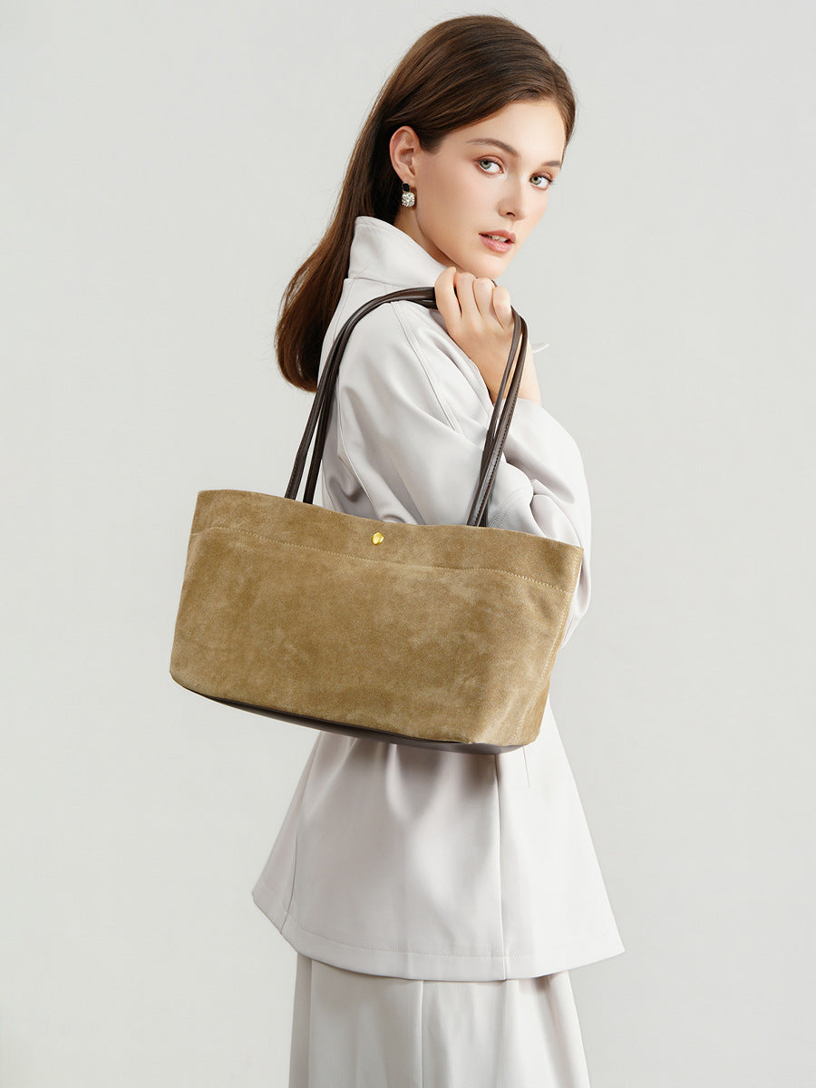 Aveline Suede-Effect Tote in Sand, worn on the shoulder