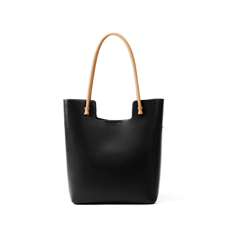 The Liora Leather Tote in Black — front view